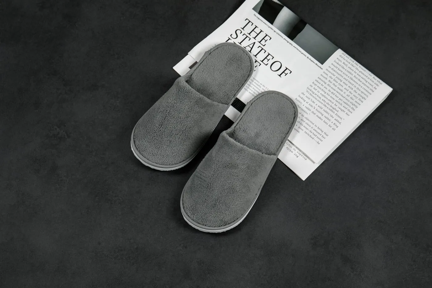 Coral-fleece hotel slippers with a 6–7mm anti-slip sole, custom-branded by UMYAN